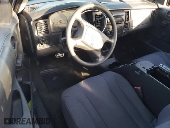 2003 Dodge Dakota с VIN 1D7GG16X33S130101, выставлен на аукционе Copart как лот 85999314 с пробегом 221 292 миль миль и Списание • Salvage title. История ставок и продаж доступна на DreamBid. Изображение 8.