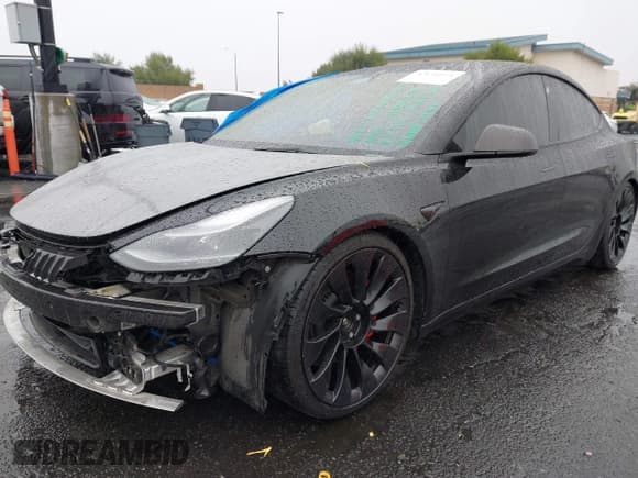 ✅ 2022 Tesla Model 3 Performance • VIN: 5YJ3E1ECXNF262138 • Lot: 43696054. Listed on IAAI with 109,940 mi. Free auction sales archive from the USA and detailed vehicle history report at DreamBid. Image 2.