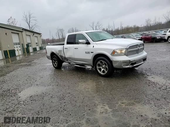 ✅ 2014 Ram 1500 Laramie • VIN: 1C6RR7JT5ES203175 • Лот: 90681655. Опубликован ранее на Copart с пробегом 192 741 миль. Бесплатный доступ к архиву аукционных продаж из США и подробный отчёт об истории автомобиля на DreamBid. Изображение 15.