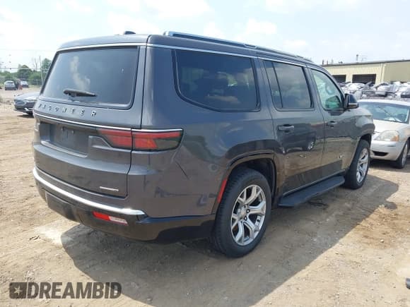 ✅ 2023 Jeep Wagoneer Series II Carbide • VIN: 1C4SJVBPXPS515874 • Lot: 42536034. Listed on IAAI with 56,284 mi. Free auction sales archive from the USA and detailed vehicle history report at DreamBid. Image 4.