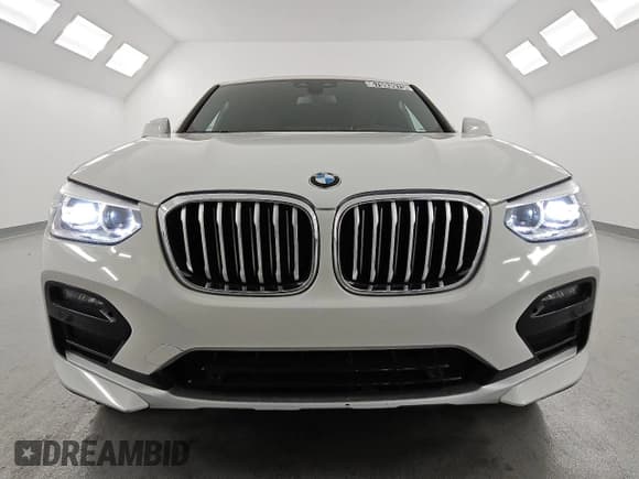 ✅ 2020 BMW X4 xDrive30i • VIN: 5UX2V1C04L9B65174 • Лот: 67093975. Опубликован ранее на Copart с пробегом 94 262 миль. Бесплатный доступ к архиву аукционных продаж из США и подробный отчёт об истории автомобиля на DreamBid. Изображение 5.