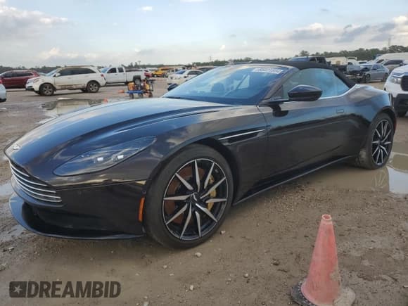 ✅ 2020 Aston Martin DB11 • VIN: SCFRMFCW6LGM09132 • Лот: 85471884. Опубликован ранее на Copart с пробегом Не указан. Бесплатный доступ к архиву аукционных продаж из США и подробный отчёт об истории автомобиля на DreamBid. Изображение 1.