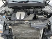 ✅ 2010 Hyundai Santa Fe Limited • VIN: 5NMSKDAG3AH383424 • Lot: 79738844. Listed on Copart with 174,729 mi. Free auction sales archive from the USA and detailed vehicle history report at DreamBid. Image 12.