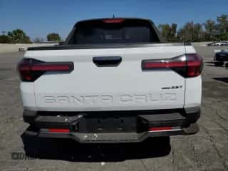 2022 Hyundai Santa Cruz Limited z VIN 5NTJEDAF0NH011964, wystawiony jako Copart lot #72095954 z przebiegiem 31 976 mil mil oraz Szkoda całkowita • Salvage title. Historia ofert i sprzedaży dostępna na DreamBid. Obrazek 6.