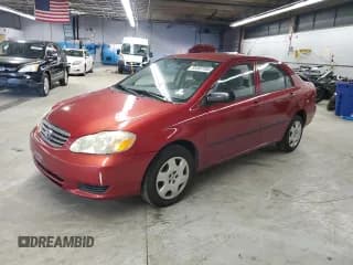 ✅ 2003 Toyota Corolla CE • VIN: 1NXBR32E03Z113786 • Lot: 93383105. Listed on Copart with 133,770 mi. Free auction sales archive from the USA and detailed vehicle history report at DreamBid. Image 1.