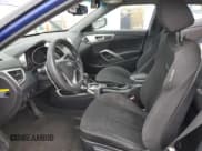 ✅ 2014 Hyundai Veloster • VIN: KMHTC6AD3EU184693 • Lot: 83912144. Wystawiony na Copart z przebiegiem 137 770 mil. Bezpłatny archiwum sprzedaży aukcyjnych z USA i szczegółowy raport historii pojazdu na DreamBid. Zdjęcie 7.