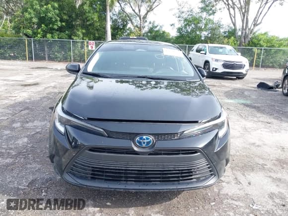 ✅ 2024 Toyota Corolla Hybrid LE • VIN: JTDBCMFE0R3052072 • Lot: 43231812. Listed on IAAI with 35,949 mi. Free auction sales archive from the USA and detailed vehicle history report at DreamBid. Image 11.