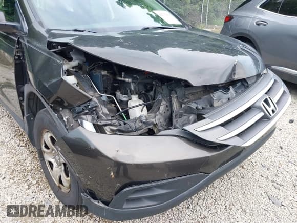 ✅ 2013 Honda CR-V LX • VIN: 5J6RM4H33DL065828 • Лот: 42732918. Опубликован ранее на IAAI с пробегом 301 289 миль. Бесплатный доступ к архиву аукционных продаж из США и подробный отчёт об истории автомобиля на DreamBid. Изображение 6.