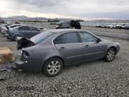 ✅ 2008 Kia Optima EX • VIN: KNAGE124185215405 • Lot: 70379555. Listed on Copart with 220,509 mi. Free auction sales archive from the USA and detailed vehicle history report at DreamBid. Image 3.