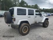 ✅ 2011 Jeep Wrangler Unlimited Sahara • VIN: 1J4BA5H10BL506715 • Lot: 85716925. Wystawiony na Copart z przebiegiem Nie podano. Bezpłatny archiwum sprzedaży aukcyjnych z USA i szczegółowy raport historii pojazdu na DreamBid. Zdjęcie 3.