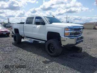2015 Chevrolet Silverado 2500HD LT z VIN 1GC1KVEG8FF502911, wystawiony jako IAAI lot #41938739 z przebiegiem Nie podano mil oraz . Historia ofert i sprzedaży dostępna na DreamBid. Obrazek 1.