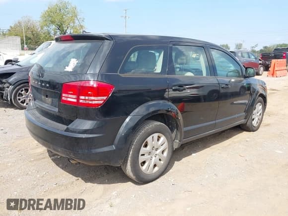 ✅ 2014 Dodge Journey SE • VIN: 3C4PDCAB9ET191688 • Lot: 43237865. Listed on IAAI with 218,594 mi. Free auction sales archive from the USA and detailed vehicle history report at DreamBid. Image 4.