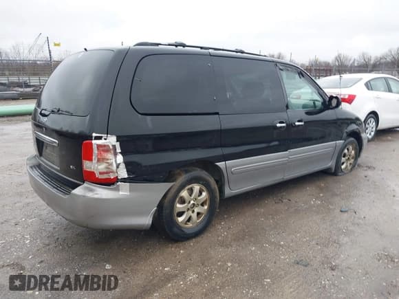 ✅ 2005 Kia Sedona LX • VIN: KNDUP132356703354 • Lot: 41529197. Listed on IAAI with Not provided. Free auction sales archive from the USA and detailed vehicle history report at DreamBid. Image 4.