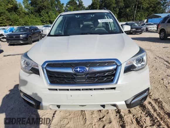 2017 Subaru Forester Limited with VIN JF2SJARCXHH523100, listed as a Copart auction lot 84559495 with 94,988 mi miles and Salvage title. Bid and sale history available at DreamBid. Image 5.