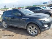 ✅ 2015 Land Rover Range Rover Evoque Pure Premium • VIN: SALVR2BGXFH059920 • Lot: 42325121. Wystawiony na IAAI z przebiegiem 165 618 mil. Bezpłatny archiwum sprzedaży aukcyjnych z USA i szczegółowy raport historii pojazdu na DreamBid. Zdjęcie 14.