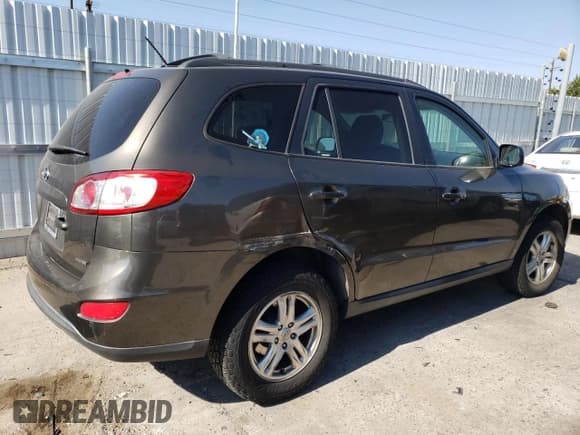 ✅ 2012 Hyundai Santa Fe GLS • VIN: 5XYZGDAB2CG152841 • Lot: 69445724. Listed on Copart with 131,617 mi. Free auction sales archive from the USA and detailed vehicle history report at DreamBid. Image 3.