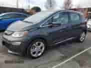 2018 Chevrolet Bolt EV LT z VIN 1G1FW6S0XJ4140438, wystawiony jako Copart lot #38987334 z przebiegiem 63 812 mil mil oraz . Historia ofert i sprzedaży dostępna na DreamBid. Obrazek 1.