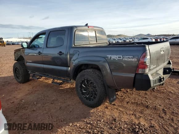 ✅ 2014 Toyota Tacoma • VIN: 3TMLU4EN2EM163301 • Lot: 92313715. Listed on Copart with 102,927 mi. Free auction sales archive from the USA and detailed vehicle history report at DreamBid. Image 2.