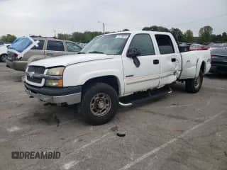 2004 Chevrolet Silverado 2500 LS с VIN 1GCGK23UX4F130325, выставлен на аукционе Copart как лот 71719515 с пробегом 198 743 миль миль и Списание • Salvage title. История ставок и продаж доступна на DreamBid. Изображение 1.