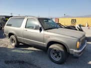 ✅ 1988 GMC Jimmy • VIN: 1GKCS18Z2J8541042 • Lot: 78100004. Wystawiony na Copart z przebiegiem 199 916 mil. Bezpłatny archiwum sprzedaży aukcyjnych z USA i szczegółowy raport historii pojazdu na DreamBid. Zdjęcie 4.