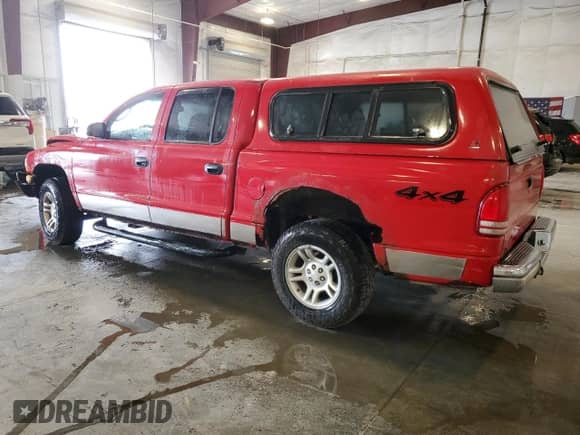 2004 Dodge Dakota SLT z VIN 1D7HG48N54S509927, wystawiony jako Copart lot #71685514 z przebiegiem 145 060 mil mil oraz Szkoda całkowita • Salvage title. Historia ofert i sprzedaży dostępna na DreamBid. Obrazek 2.