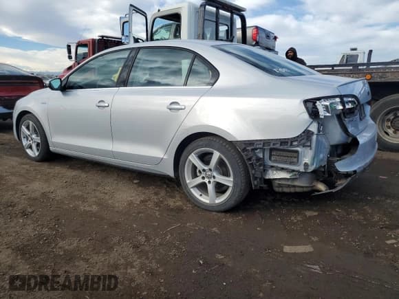 ✅ 2013 Volkswagen Jetta Hybrid SE • VIN: 3VW637AJ3DM299484 • Лот: 43634725. Опубликован ранее на Copart с пробегом 64 805 миль. Бесплатный доступ к архиву аукционных продаж из США и подробный отчёт об истории автомобиля на DreamBid. Изображение 2.