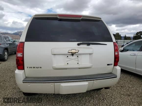 2009 Chevrolet Tahoe LTZ с VIN 1GNFK33249R215853, выставлен на аукционе Copart как лот 80132245 с пробегом 208 877 миль миль и Списание • Salvage title. История ставок и продаж доступна на DreamBid. Изображение 6.