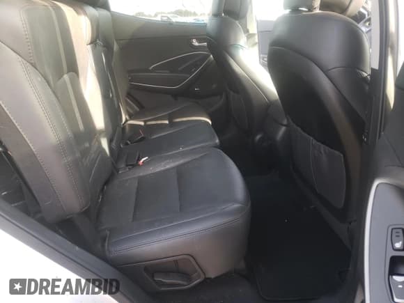 ✅ 2017 Hyundai Santa Fe Ultimate • VIN: 5XYZWDLA0HG496733 • Лот: 77305753. Опубликован ранее на Copart с пробегом 66 774 миль. Бесплатный доступ к архиву аукционных продаж из США и подробный отчёт об истории автомобиля на DreamBid. Изображение 10.