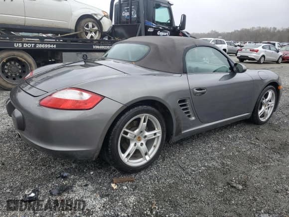 ✅ 2007 Porsche Boxster • VIN: WP0CA29857U711677 • Лот: 79859924. Опубликован ранее на Copart с пробегом 83 123 миль. Бесплатный доступ к архиву аукционных продаж из США и подробный отчёт об истории автомобиля на DreamBid. Изображение 3.