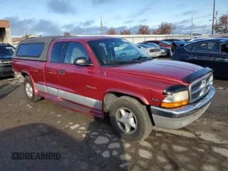 ✅ 1997 Dodge Dakota • VIN: 1B7GL23X4VS157665 • Lot: 79010744. Wystawiony na Copart z przebiegiem 101 809 mil. Bezpłatny archiwum sprzedaży aukcyjnych z USA i szczegółowy raport historii pojazdu na DreamBid. Zdjęcie 4.