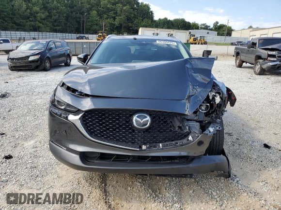 ✅ 2023 Mazda CX-30 Premium • VIN: 3MVDMBDY7PM572335 • Lot: 66309425. Wystawiony na Copart z przebiegiem 87 436 mil. Bezpłatny archiwum sprzedaży aukcyjnych z USA i szczegółowy raport historii pojazdu na DreamBid. Zdjęcie 5.