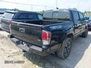 ✅ 2021 Toyota Tacoma SR • VIN: 3TMCZ5AN1MM404910 • Lot: 42653848. Wystawiony na IAAI z przebiegiem 83 201 mil. Bezpłatny archiwum sprzedaży aukcyjnych z USA i szczegółowy raport historii pojazdu na DreamBid. Zdjęcie 4.