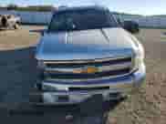 2013 Chevrolet Silverado 1500 LT with VIN 3GCPKSE71DG370823, listed as a Copart auction lot 90091465 with 128,265 mi miles and Salvage title. Bid and sale history available at DreamBid. Image 5.