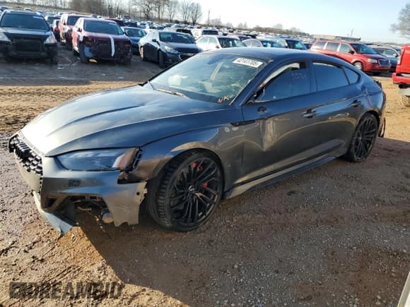 ✅ 2021 Audi RS 5 Sportback • VIN: WUAAWCF53MA900661 • Lot: 42141705. Listed on Copart with 35,564 mi. Free auction sales archive from the USA and detailed vehicle history report at DreamBid. Image 1.