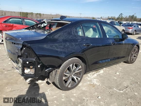 ✅ 2023 Volvo S60 Plus Dark Theme • VIN: 7JRL12TW5PG252240 • Лот: 87483044. Опубликован ранее на Copart с пробегом 26 701 миль. Бесплатный доступ к архиву аукционных продаж из США и подробный отчёт об истории автомобиля на DreamBid. Изображение 3.