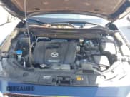 ✅ 2018 Mazda CX-5 Touring • VIN: JM3KFACM5J1473522 • Lot: 43315278. Listed on IAAI with 56,327 mi. Free auction sales archive from the USA and detailed vehicle history report at DreamBid. Image 10.