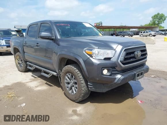 ✅ 2023 Toyota Tacoma SR5 • VIN: 3TMAZ5CN0PM200768 • Лот: 42439143. Опубликован ранее на IAAI с пробегом 68 631 миль. Бесплатный доступ к архиву аукционных продаж из США и подробный отчёт об истории автомобиля на DreamBid. Изображение 1.