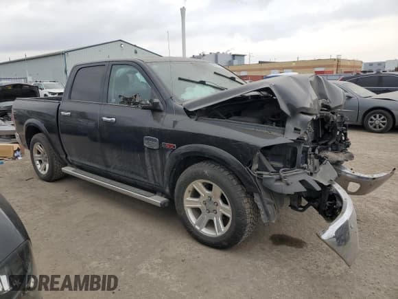 ✅ 2015 Ram 1500 Laramie Limited • VIN: 1C6RR7PM9FS726250 • Lot: 87621565. Listed on Copart with 110,871 mi. Free auction sales archive from the USA and detailed vehicle history report at DreamBid. Image 4.