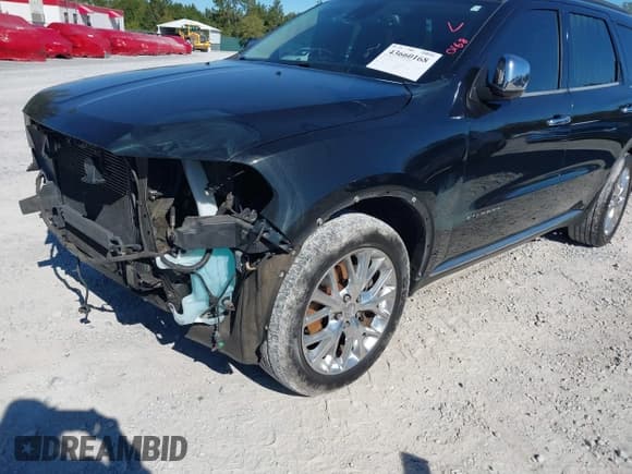 ✅ 2014 Dodge Durango Citadel • VIN: 1C4SDHET7EC970402 • Лот: 43660168. Опубликован ранее на IAAI с пробегом 247 744 миль. Бесплатный доступ к архиву аукционных продаж из США и подробный отчёт об истории автомобиля на DreamBid. Изображение 6.