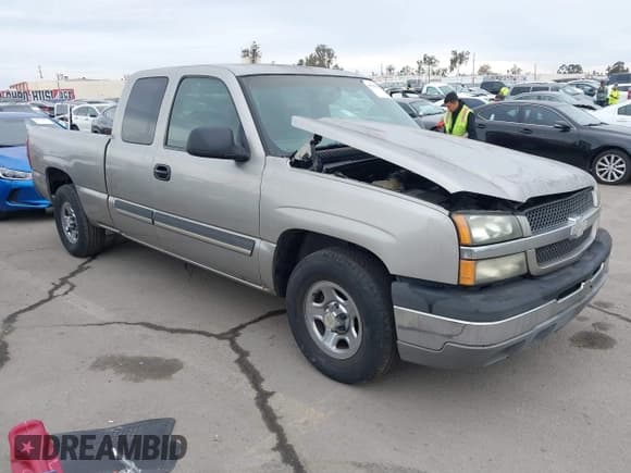 ✅ 2003 Chevrolet Silverado 1500 LS • VIN: 2GCEC19X431289847 • Lot: 40978969. Listed on IAAI with 165,005 mi. Free auction sales archive from the USA and detailed vehicle history report at DreamBid. Image 1.