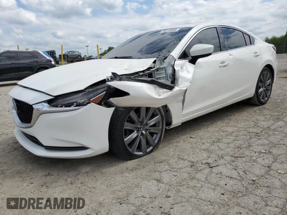 ✅ 2021 Mazda 6 Touring • VIN: JM1GL1VM3M1615598 • Лот: 70013505. Опубликован ранее на Copart с пробегом 51 640 миль. Бесплатный доступ к архиву аукционных продаж из США и подробный отчёт об истории автомобиля на DreamBid. Изображение 1.