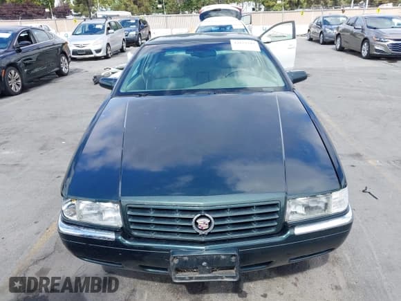 ✅ 1998 Cadillac Eldorado Touring • VIN: 1G6ET1299WU613236 • Lot: 43173727. Listed on IAAI with 165,556 mi. Free auction sales archive from the USA and detailed vehicle history report at DreamBid. Image 6.