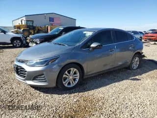 ✅ 2019 Chevrolet Cruze LT • VIN: 1G1BE5SMXK7136758 • Lot: 82770765. Listed on Copart with 132,017 mi. Free auction sales archive from the USA and detailed vehicle history report at DreamBid. Image 1.