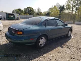 ✅ 1996 Ford Taurus GL • VIN: 1FALP52U2TG209229 • Lot: 66408114. Listed on Copart with 134,089 mi. Free auction sales archive from the USA and detailed vehicle history report at DreamBid. Image 3.