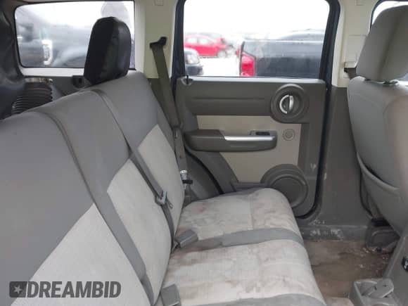 2008 Dodge Nitro SLT z VIN 1D8GT58K98W235595, wystawiony jako IAAI lot #42033233 z przebiegiem Nie podano mil oraz . Historia ofert i sprzedaży dostępna na DreamBid. Obrazek 8.