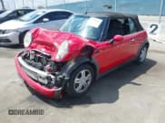 ✅ 2007 MINI Convertible • VIN: WMWRF335X7TG16764 • Lot: 42258381. Listed on IAAI with 129,416 mi. Free auction sales archive from the USA and detailed vehicle history report at DreamBid. Image 17.