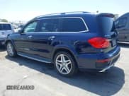 ✅ 2015 Mercedes-Benz GL 550 • VIN: 4JGDF7DE4FA447377 • Лот: 42267454. Опубликован ранее на IAAI с пробегом 164 738 миль. Бесплатный доступ к архиву аукционных продаж из США и подробный отчёт об истории автомобиля на DreamBid. Изображение 3.