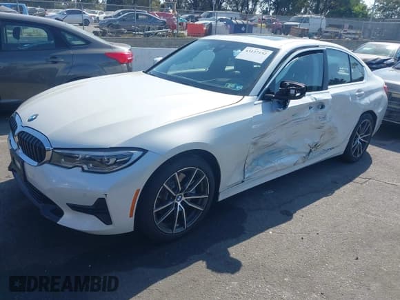 ✅ 2019 BMW 3 Series 330i xDrive • VIN: WBA5R7C59KAJ79094 • Лот: 43137152. Опубликован ранее на IAAI с пробегом 71 086 миль. Бесплатный доступ к архиву аукционных продаж из США и подробный отчёт об истории автомобиля на DreamBid. Изображение 2.