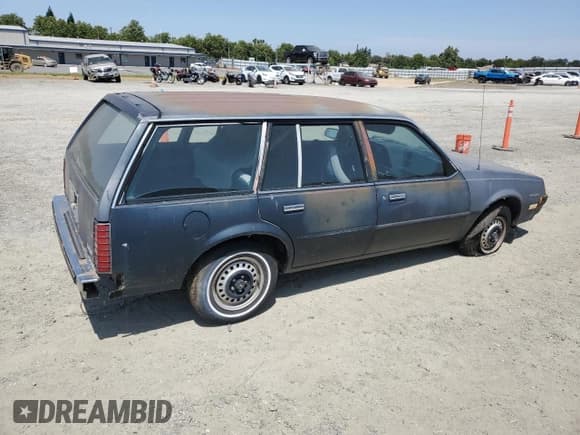 ✅ 1985 Pontiac Sunbird • VIN: 1G2JB350XF7575719 • Lot: 60540725. Listed on Copart with 60,511 mi. Free auction sales archive from the USA and detailed vehicle history report at DreamBid. Image 3.
