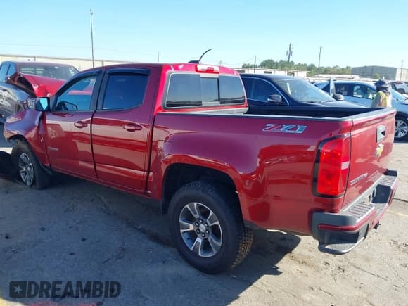 ✅ 2020 Chevrolet Colorado 4WD Z71 • VIN: 1GCGTDEN5L1205667 • Lot: 43642173. Listed on IAAI with 88,739 mi. Free auction sales archive from the USA and detailed vehicle history report at DreamBid. Image 3.